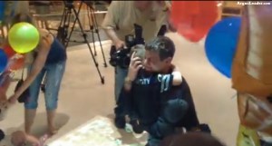 Christopher Duke embraces his son, Brayden, after returning home from Afghanistan.